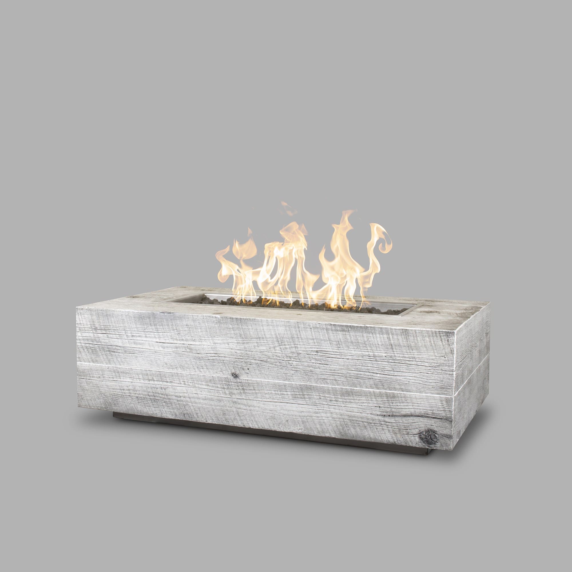 The Outdoor Plus Coronado Wood Grain Fire Pit in Ivorywith flame on white background 3