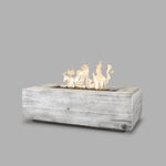 The Outdoor Plus Coronado Wood Grain Fire Pit in Ivorywith flame on white background3
