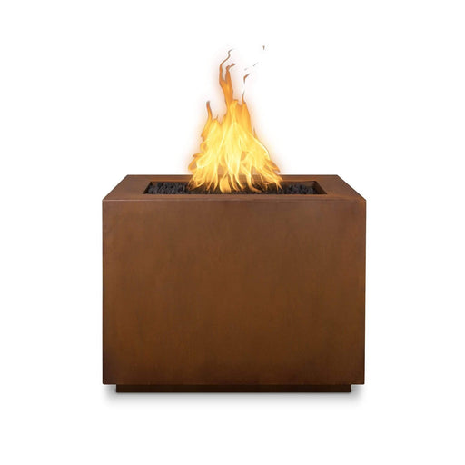 The Outdoor Plus Forma Fire Pit in corten steel with flame on a white background 